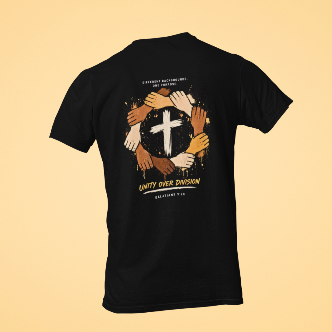 Black t-shirt with a graphic of interlocked hands and a cross, on a beige background.