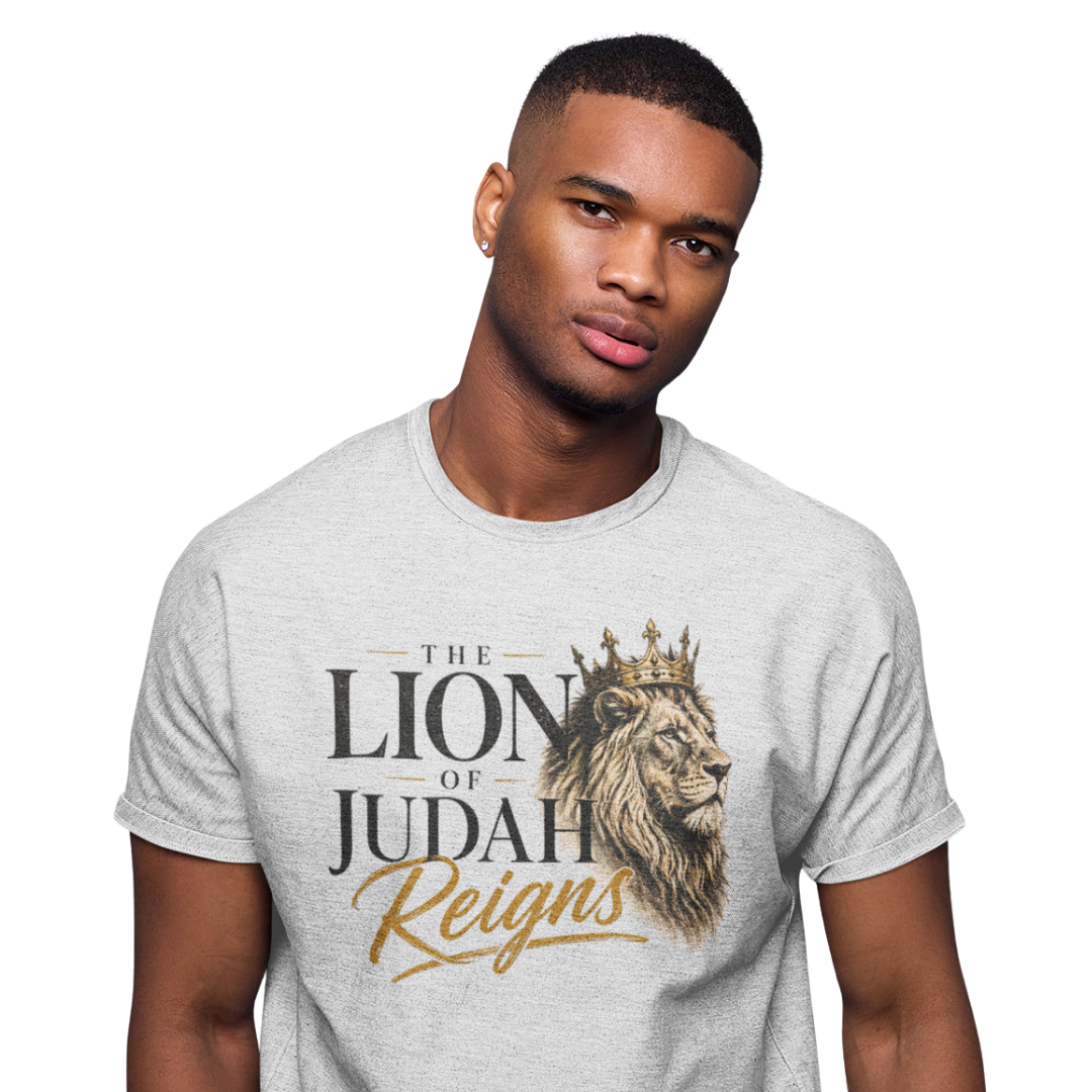 Man wearing a gray t-shirt with 'The Lion of Judah Reigns' design on a white background