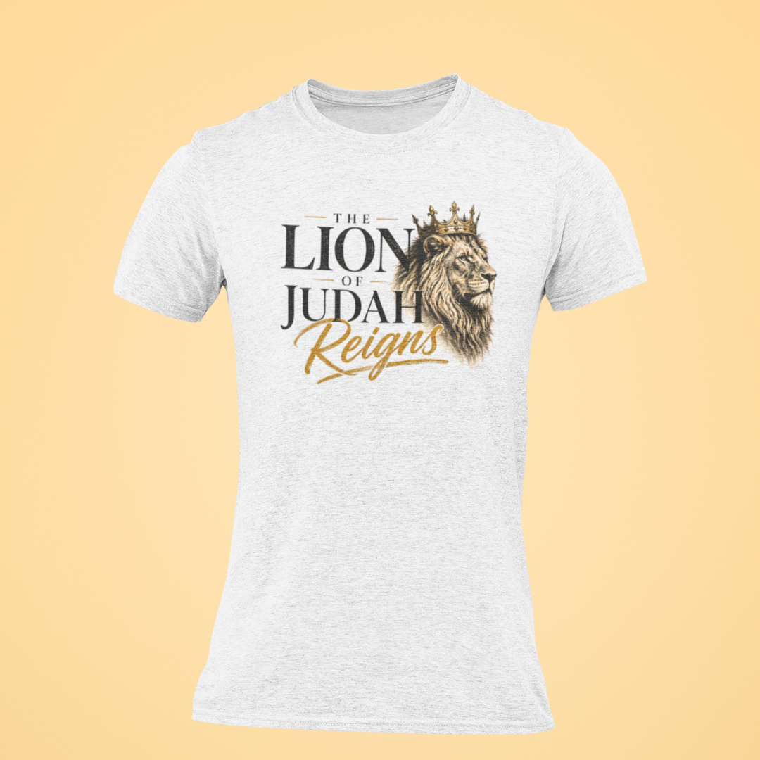 White t-shirt with lion graphic and text 'The Lion of Judah Reigns' on a beige background