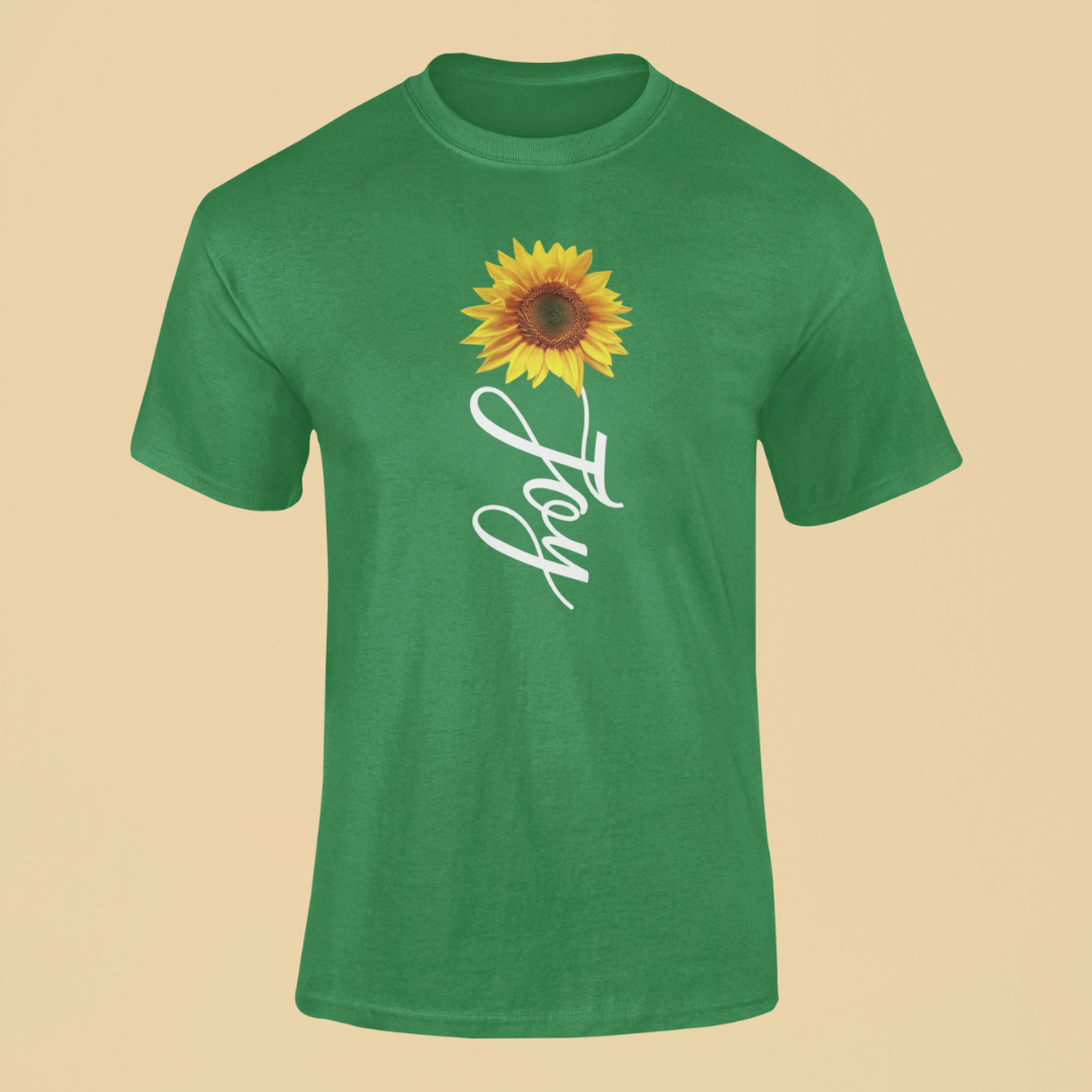 Green t-shirt with a sunflower and 'Joy' text on a beige background