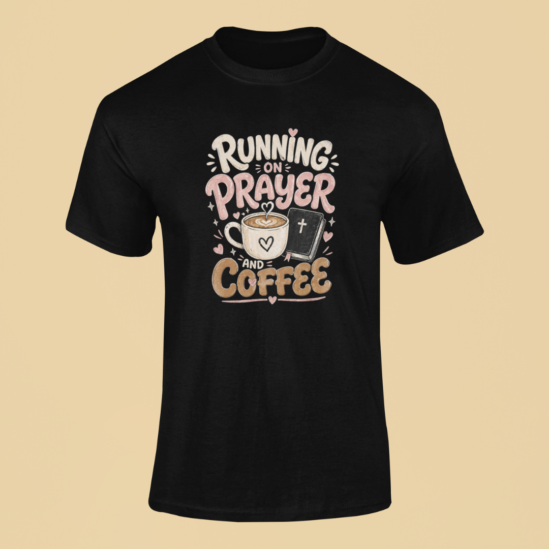 Black t-shirt with 'Running on Prayer and Coffee' text design on a beige background